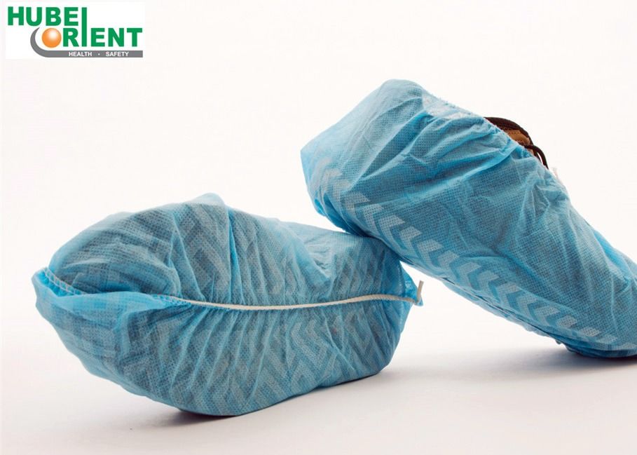 OEM Disposable 35gsm Nonwoven Shoe Cover With Non Slip Stripes Sole